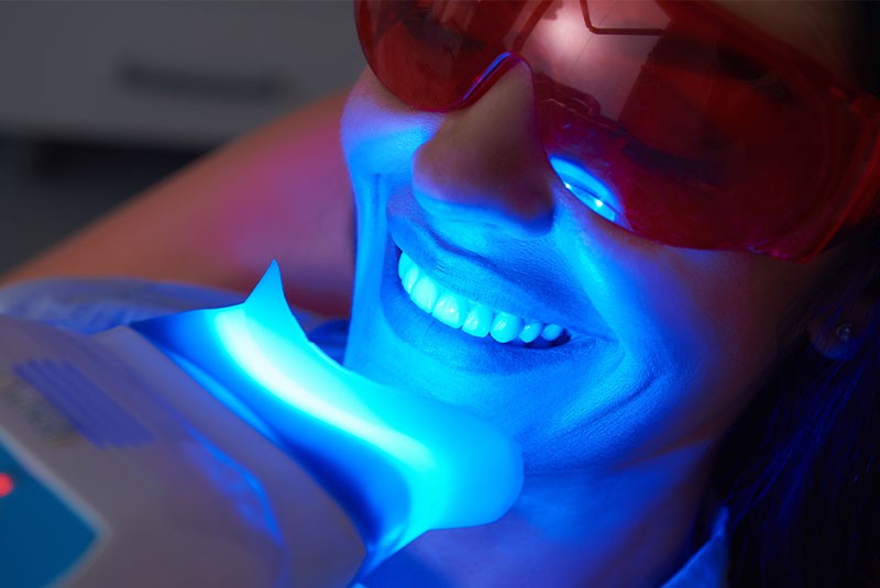 dental patient receiving teeth whitening procedure